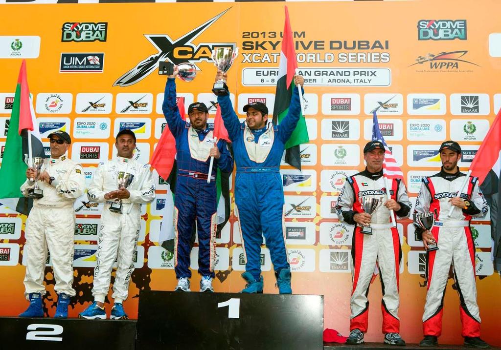 Dubai Duty Free Speed Cat Run race winners stand on the podium at the end of the 2013 UIM Skydive Dubai XCAT World series Round 5 on Lake Maggiore in Arona, Italy, September 7, 2013. © Jack Dabaghian